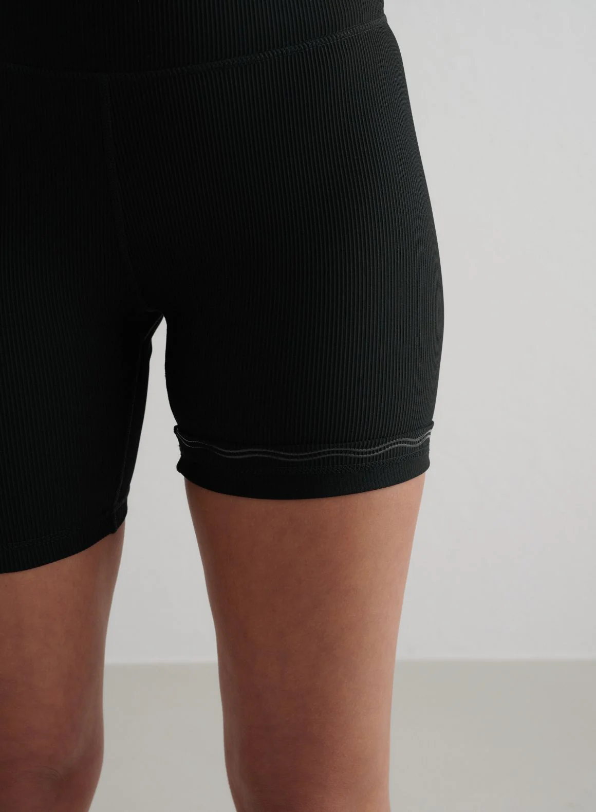 Black Ribbed Performance Midi Biker Shorts - Image 4